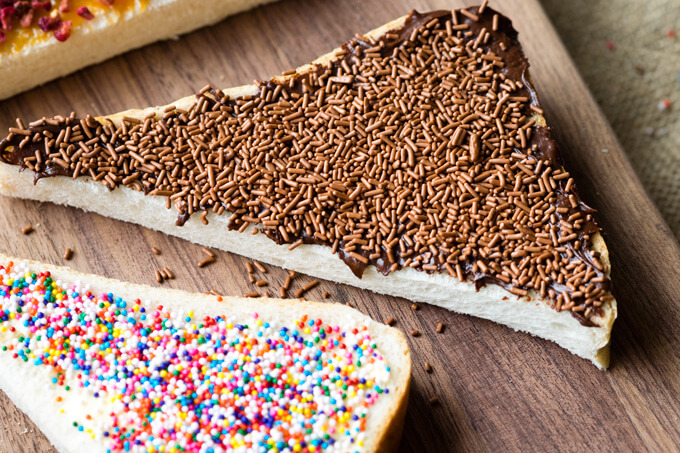 Chocolate sprinkles on chocolate spread on toast cut into a triangle | The Worktop