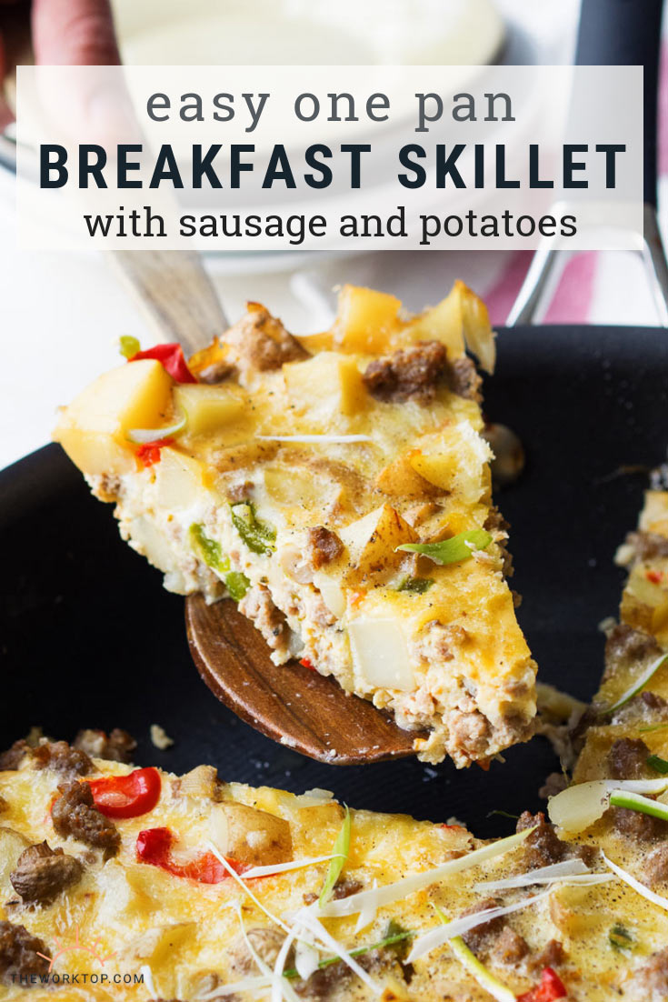 Breakfast skillet recipe - potatoes, eggs cheese, sausage in a skillet with spatula | The Worktop
