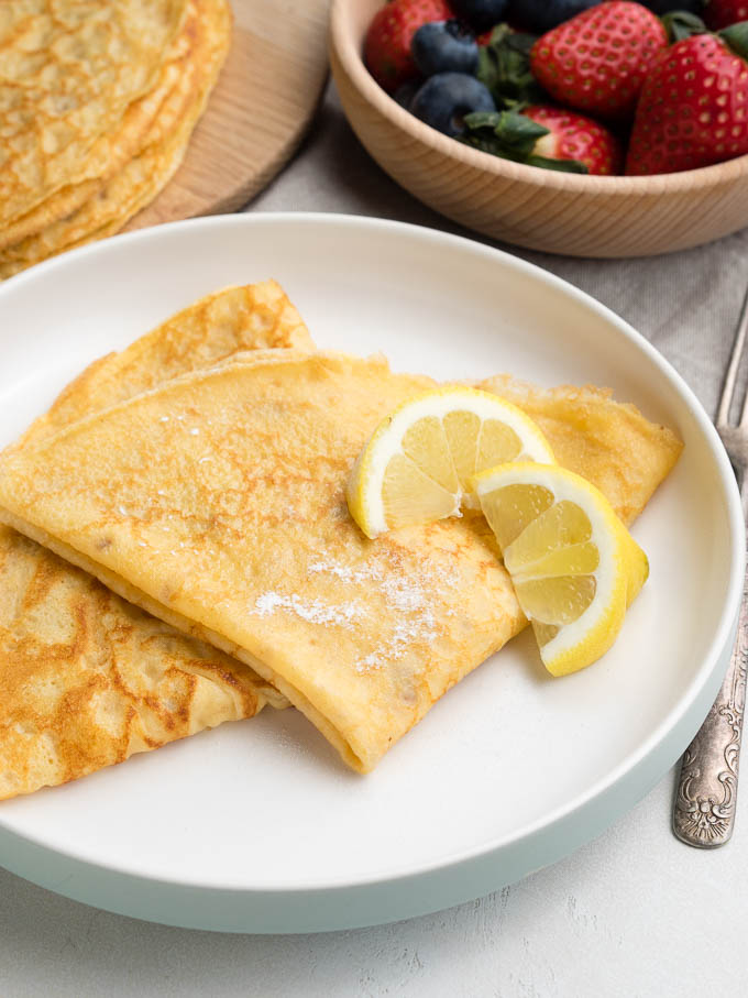 Easy Crepes Recipe - Crepes with lemon and powdered sugar for breakfast | The Worktop