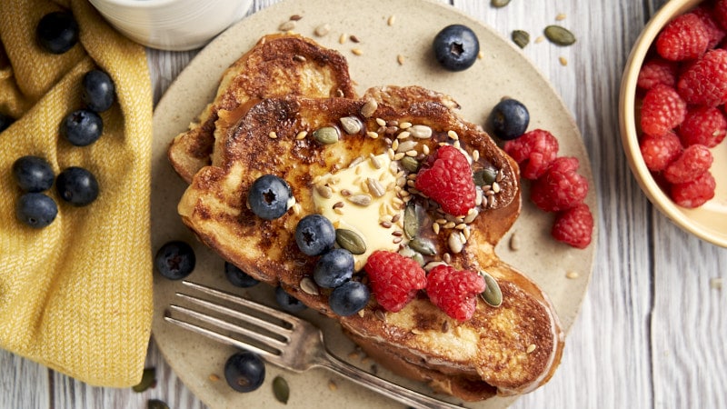 Challah Bread French Toast - Overhead with toppings | The Worktop