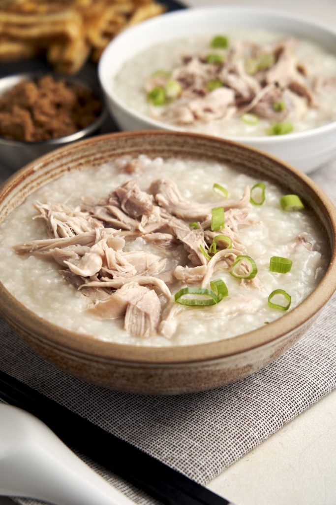Chicken Congee Slow Cooker - 2 bowls of congee with shredded chicken | The Worktop