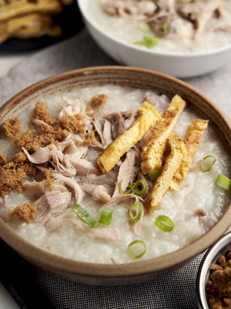 Chicken Congee - Slow Cooker Chinese Recipe - served with pork floss and egg | The Worktop
