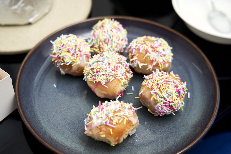 Donut Holes covered in sprinkles - getting ready to make a donut cake tower | The Worktop