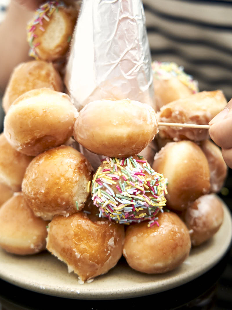 Close up of donut cake tower to show how to place the donut holes on the tree | The Worktop