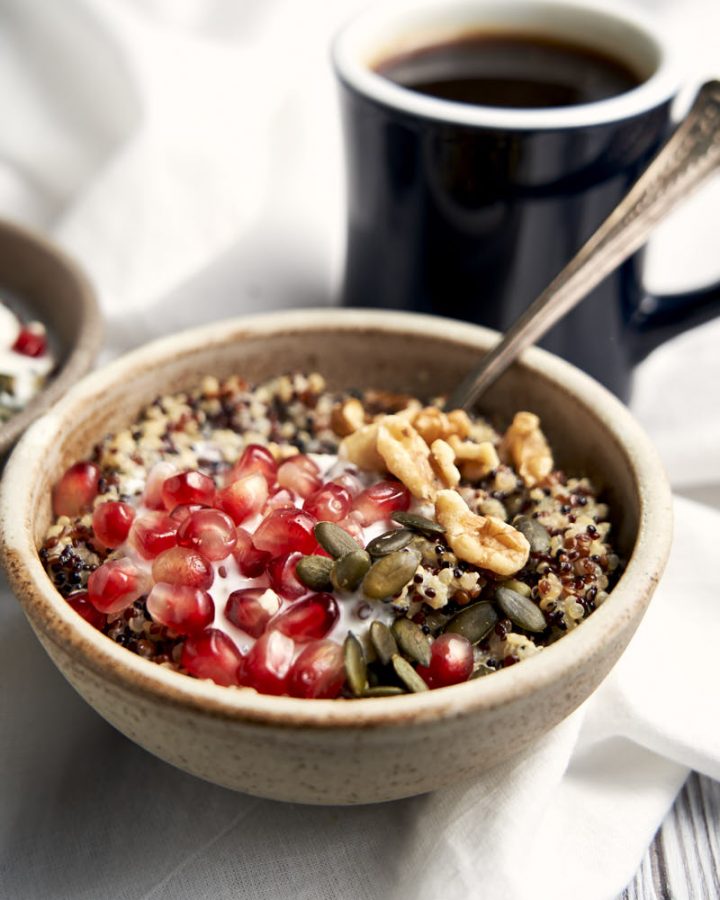 Quinoa Porridge Oatmeal Breakfast - served in bowl with healthy toppings | The Worktop