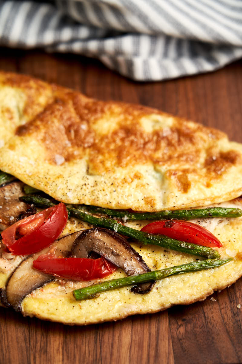 Shredded Chicken Omelette Recipe - to show mushrooms, asparagus and tomatoes | The Worktop