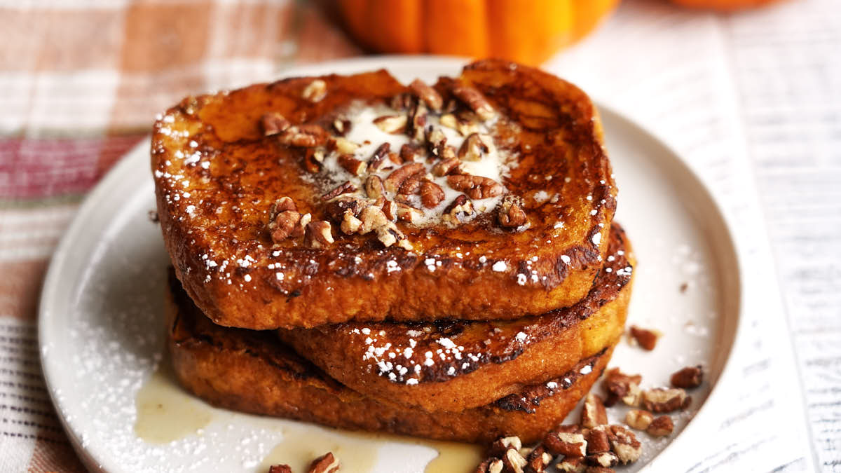 Pumpkin French Toast - on a plate with maple syrup and pecans | The Worktop